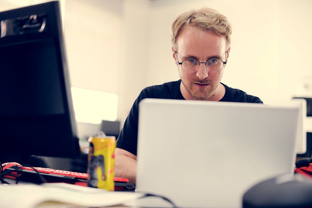Caucasian man using computer laptop