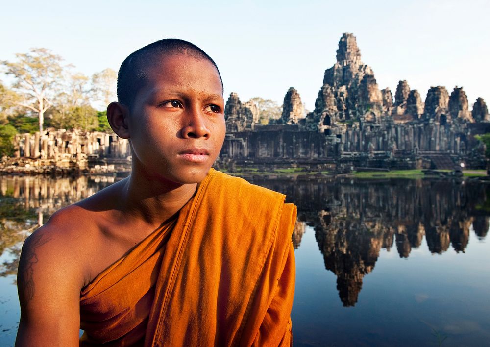 Contemplating monk, Angkor Wat, Siem Reap, Cambodia.