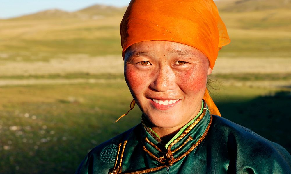 Beautiful young Mongolian lady in the late afternoon sun.
