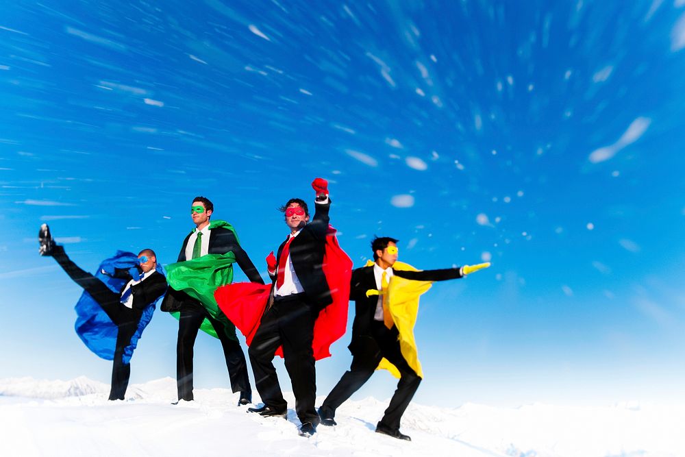 Business superheroes posing in the blizzard 