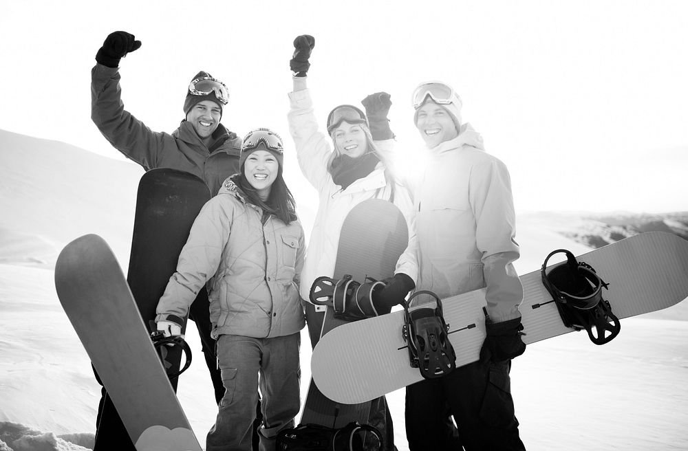 Snowboarders on Top of the Mountain.
