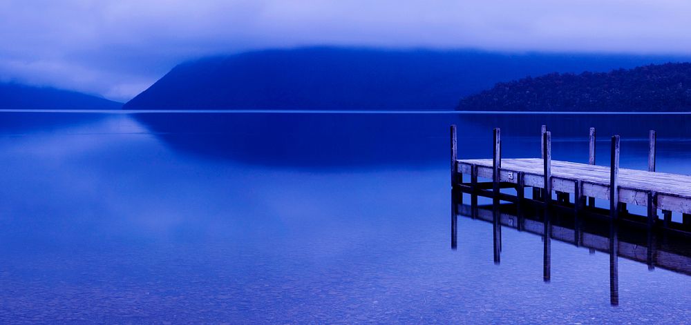 Tranquil peaceful lake with jetty, New Zealand.