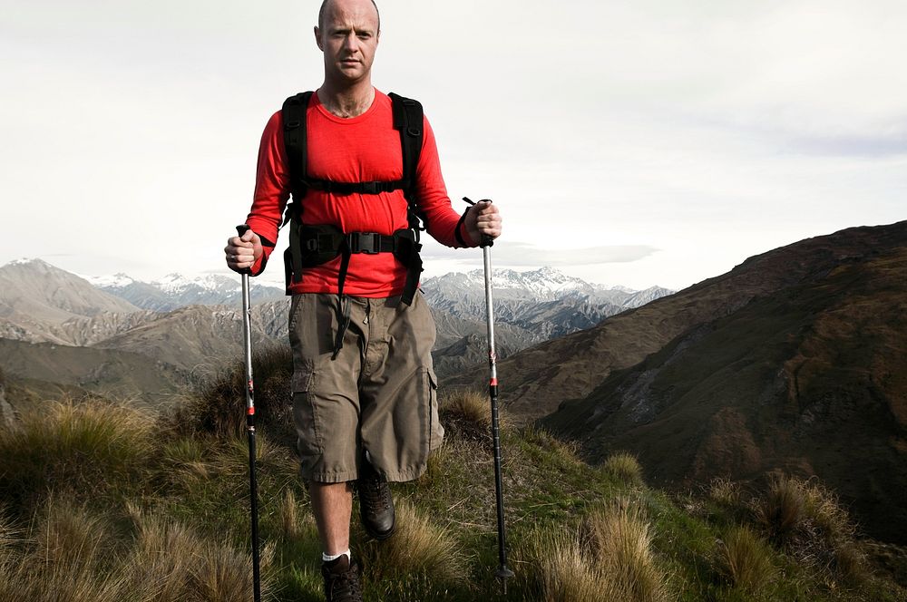 Extreme Hiking across rugged mountains, New Zealands Southern Alps.