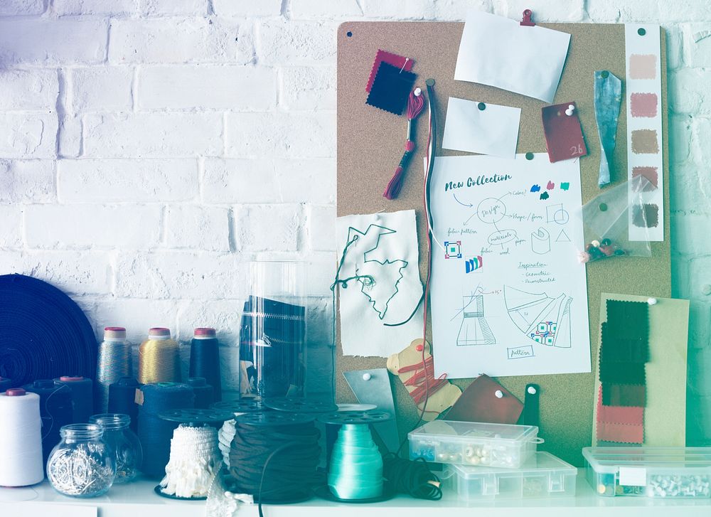 Fashion design's creative messy desk