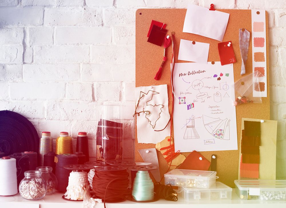 Fashion design's creative messy desk