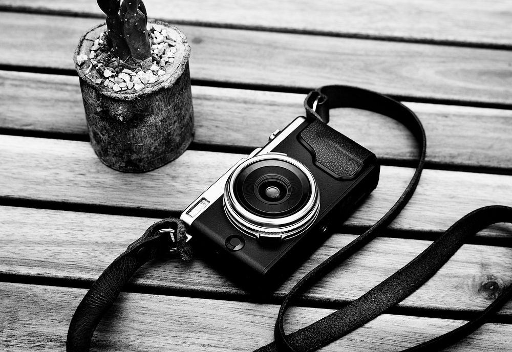 Film camera old vintage classic on wooden table
