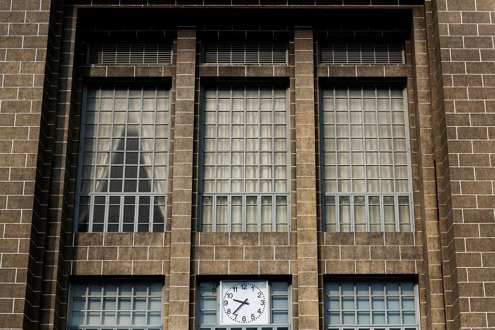 Old building exterior window and clock