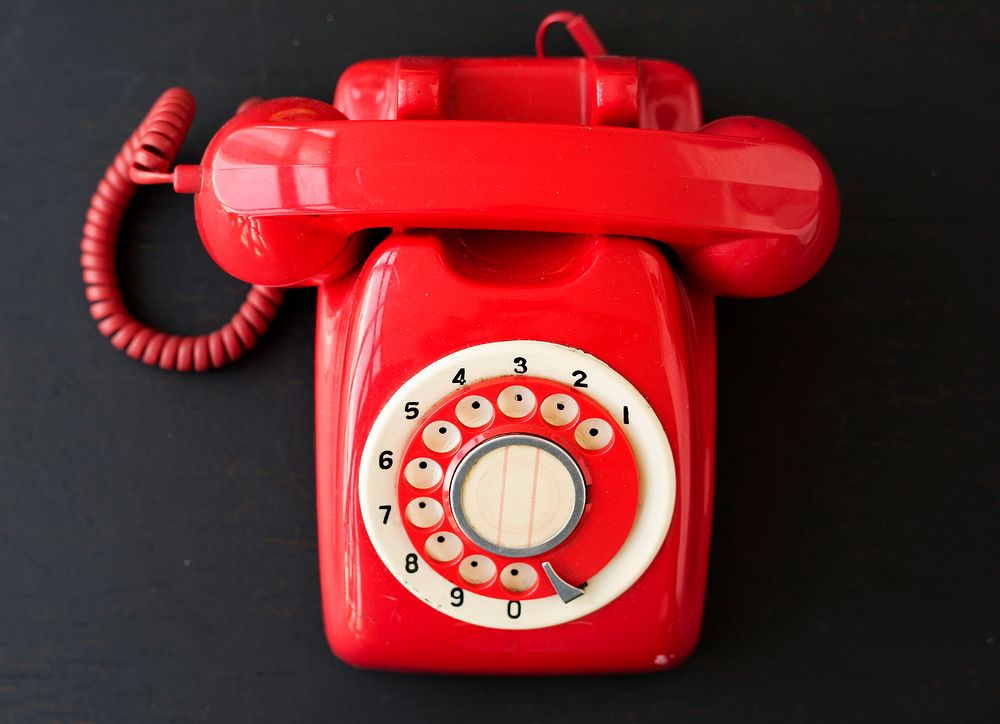 Red Retro Vintage Telephone on Black Background