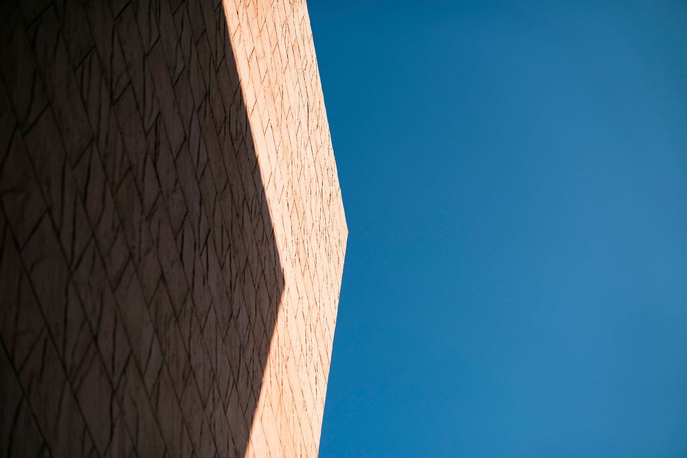 Sky and building exterior with shadow