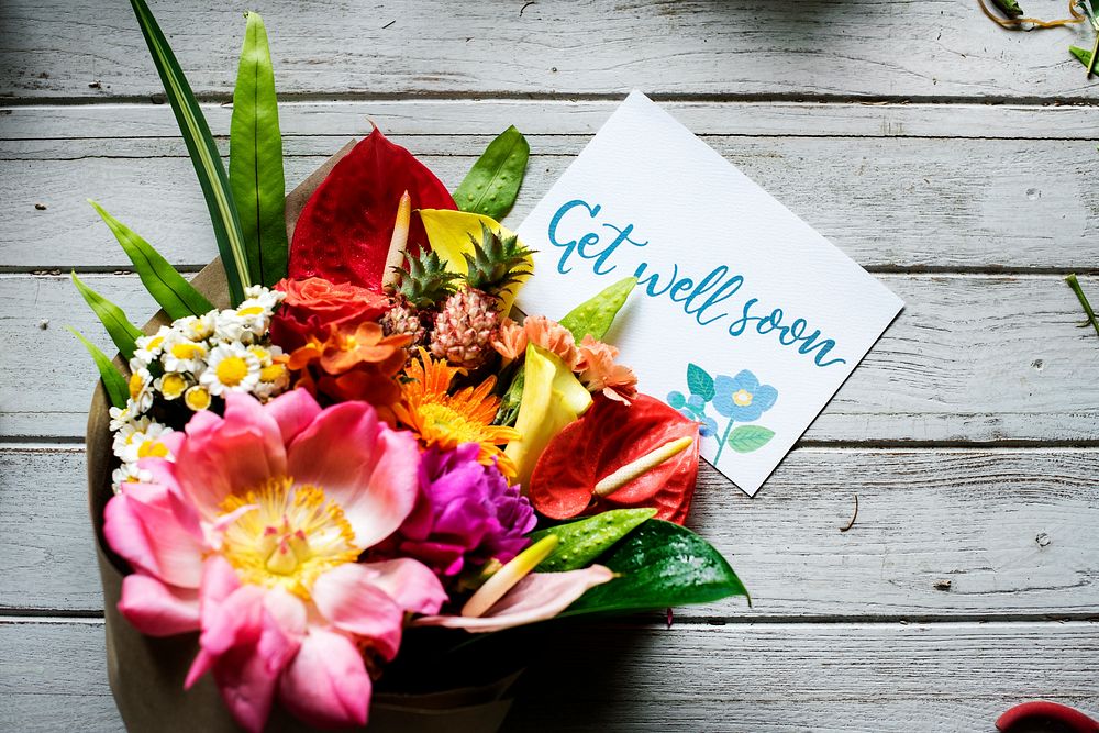 Flower bouquet with get well soon card