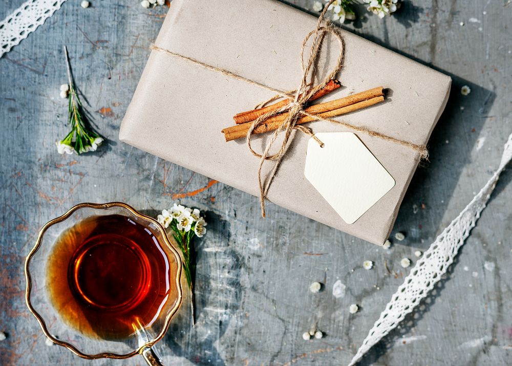 Aerial view of tea cup with gift box