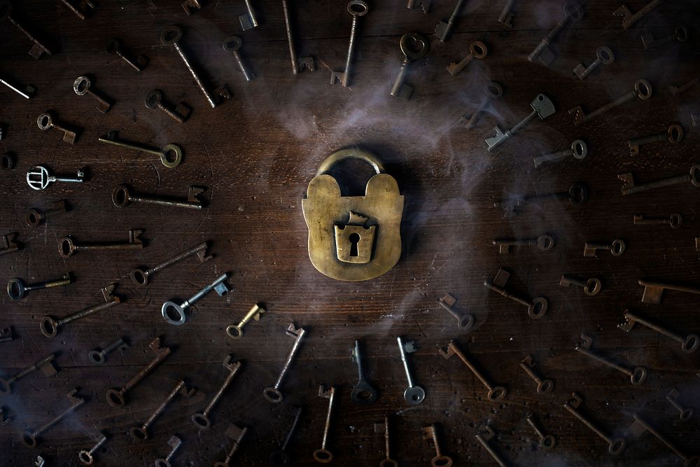 Old padlock at the center of a keys