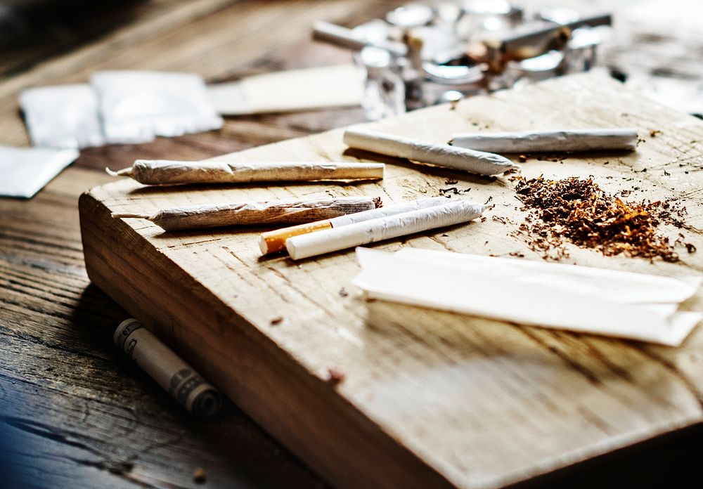 Rolls of cigarette on the table