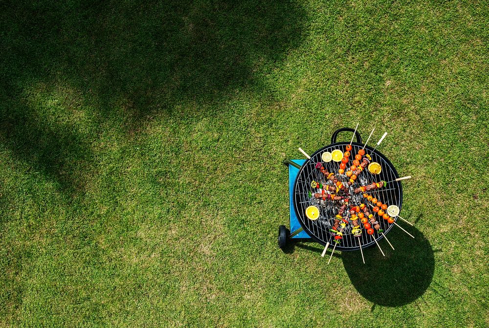Aerial view of barbecues steaks on the charcoals grill
