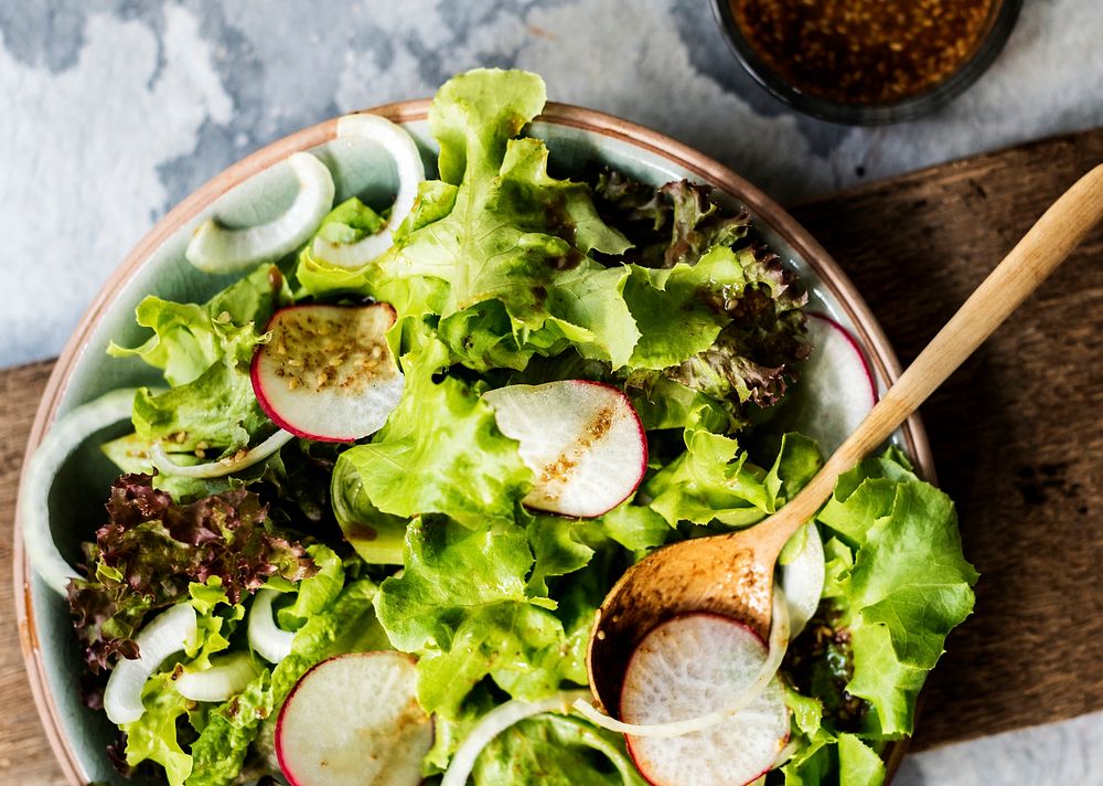 Closeup of salad bowl with dressing | Premium Photo - rawpixel