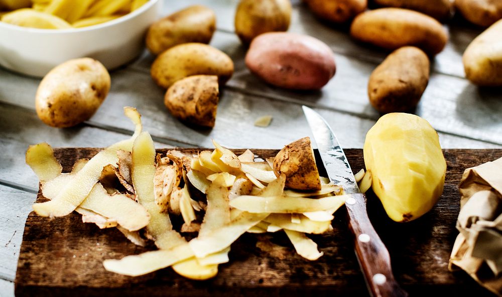 Potato and peel potato in a kitchen