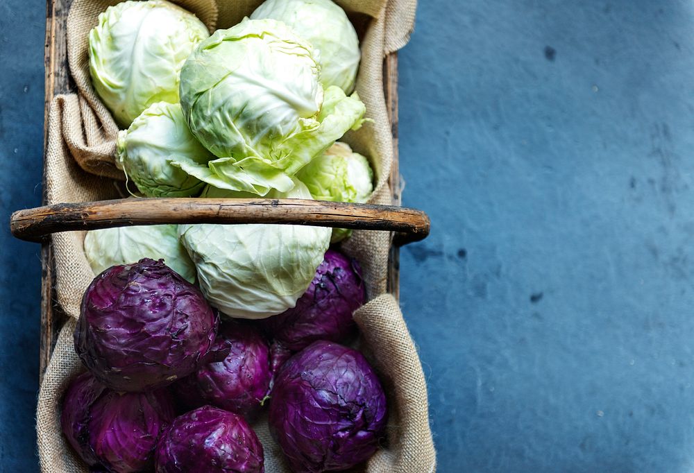 Diverse cabbage in a wooden bucket