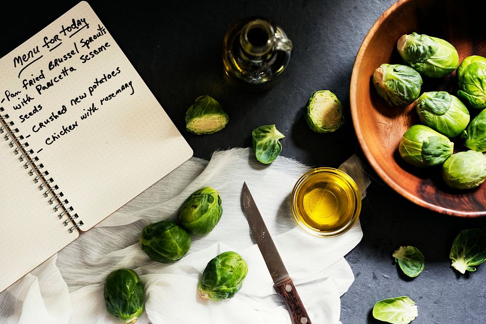 Aerial view of brussle sprouts with notebook