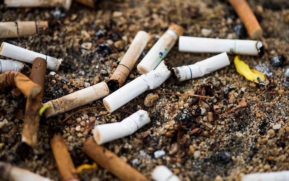Pile of cigarette filter smoke cancer