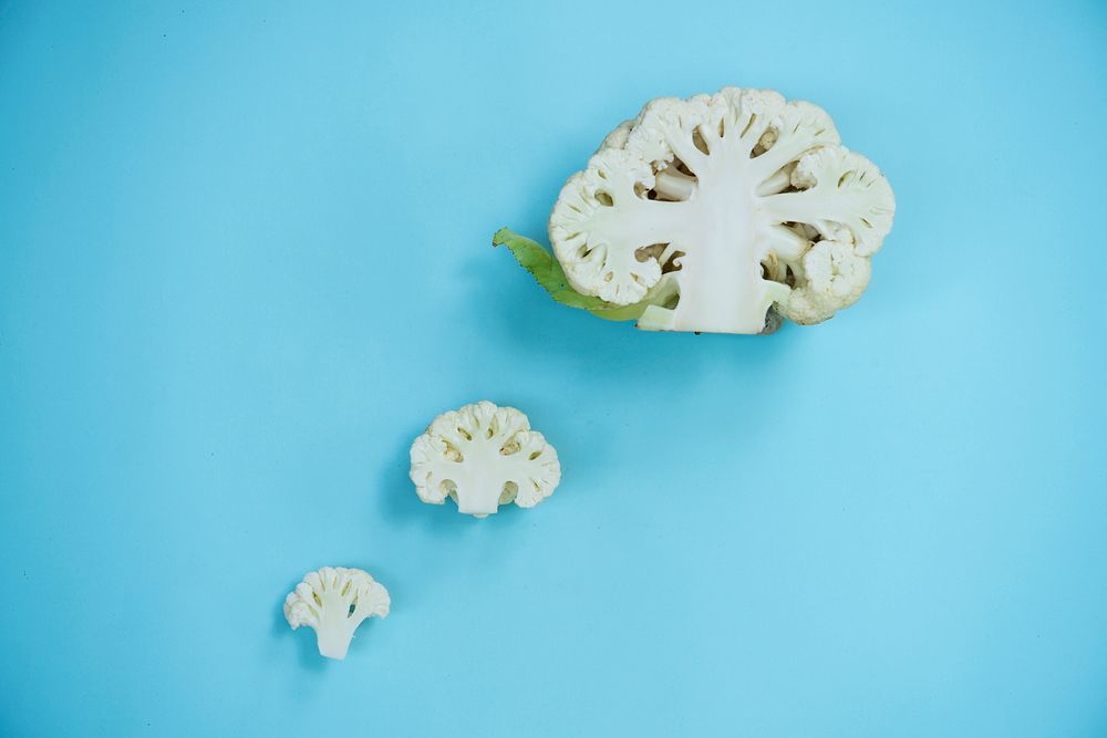 Aerial of single cauliflower on the background