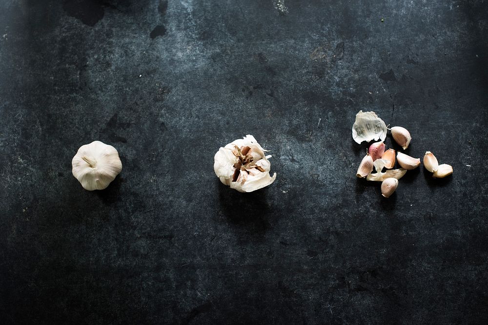 Cloves of garlic isolated on background