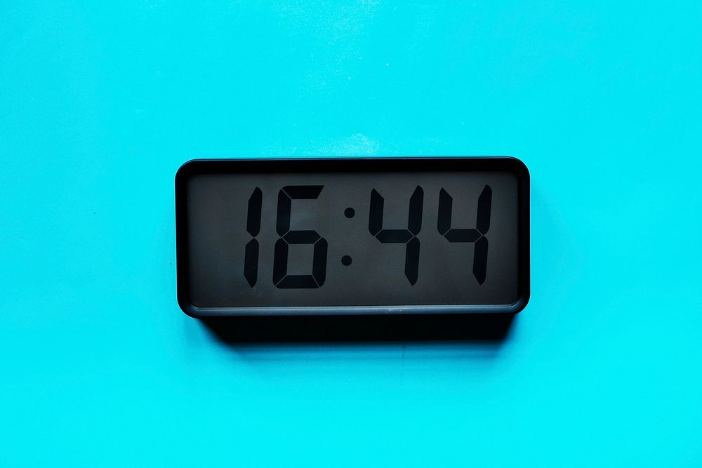 Digital clock on blue background