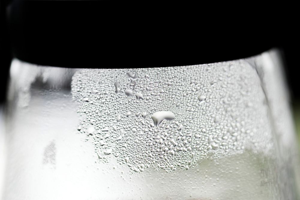 Closeup of water steam on glassware surface