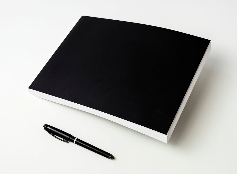 Closeup of black notebook isolated on white