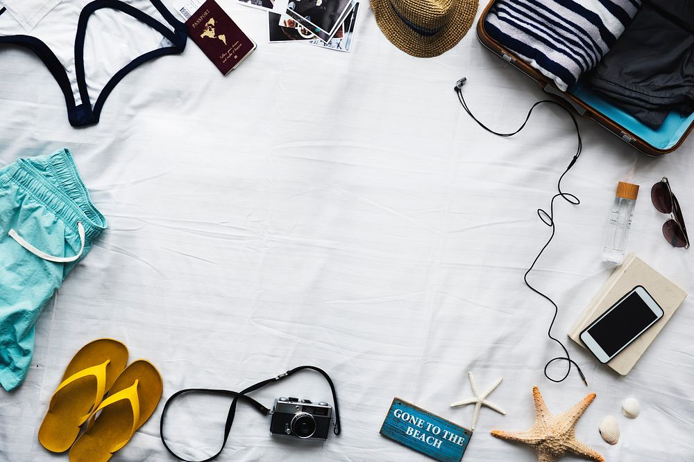Travel objects on a bed