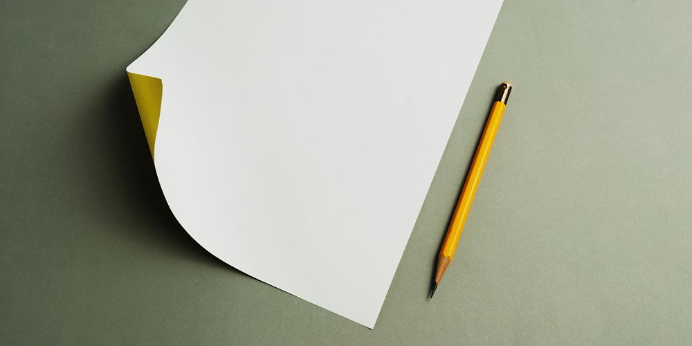 Blank paper and pencil isolated on background
