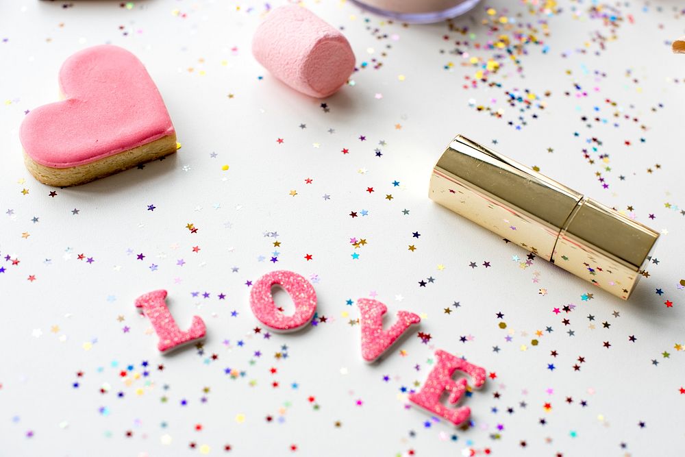 Love word and objects isolated on background
