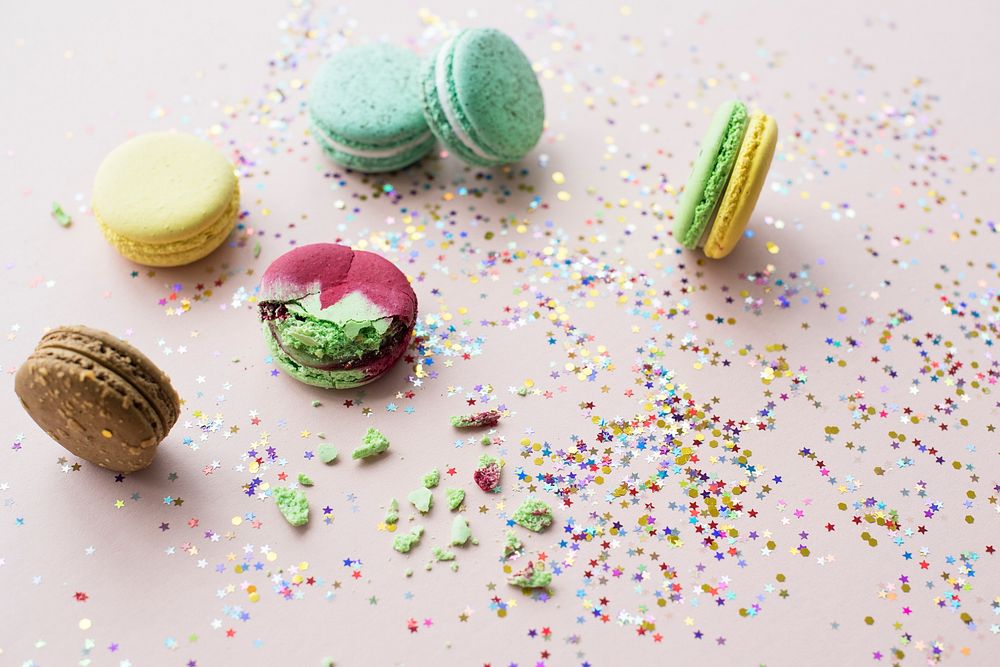 Macaroon decoration by confetti isolated on background