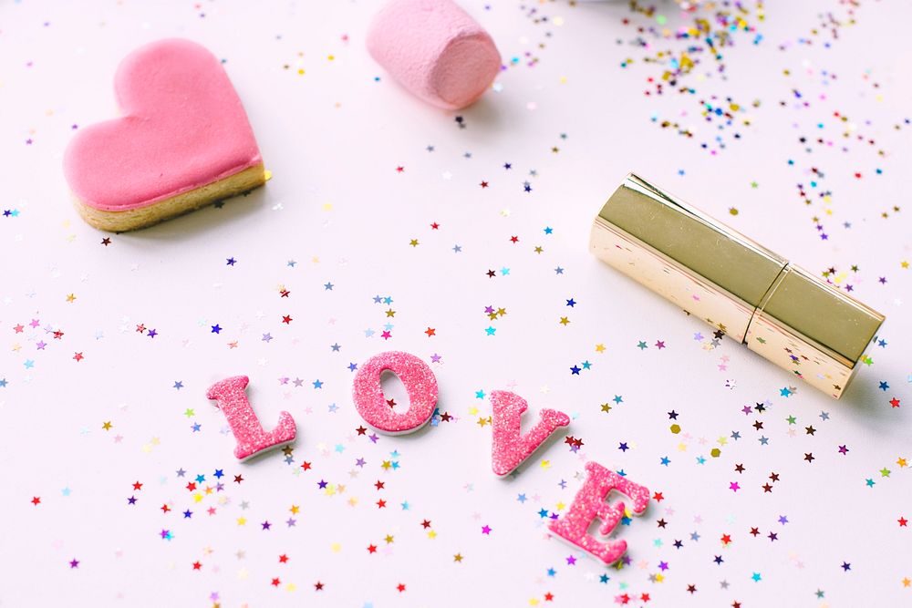 Love word and objects isolated on background