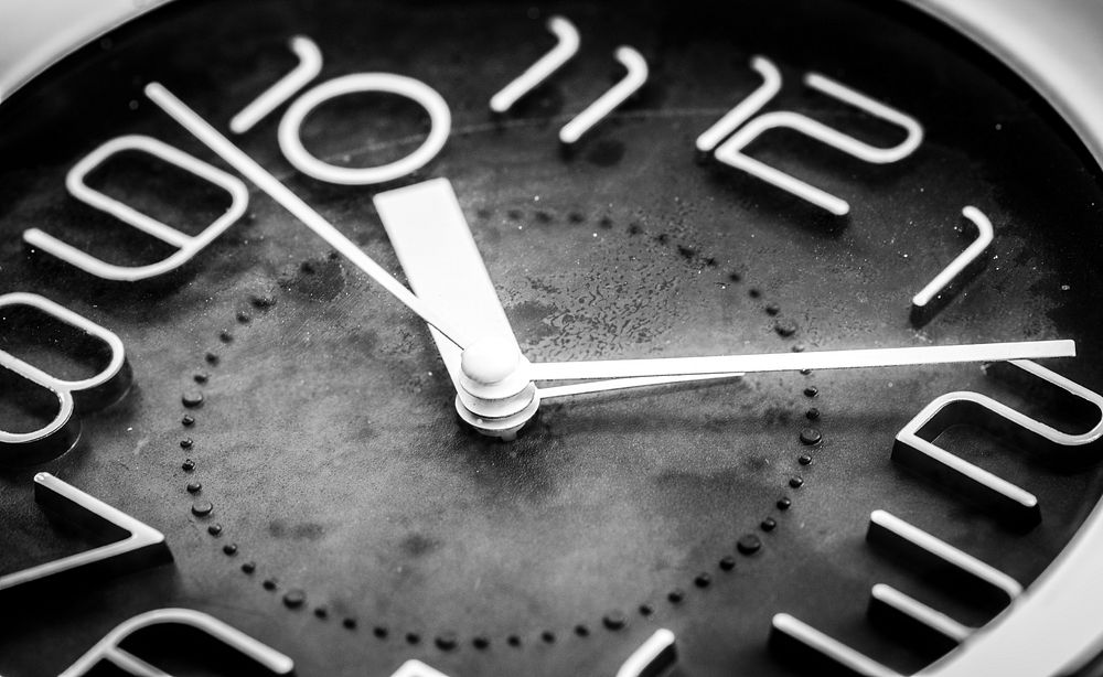 Closeup of watch clock time isolated