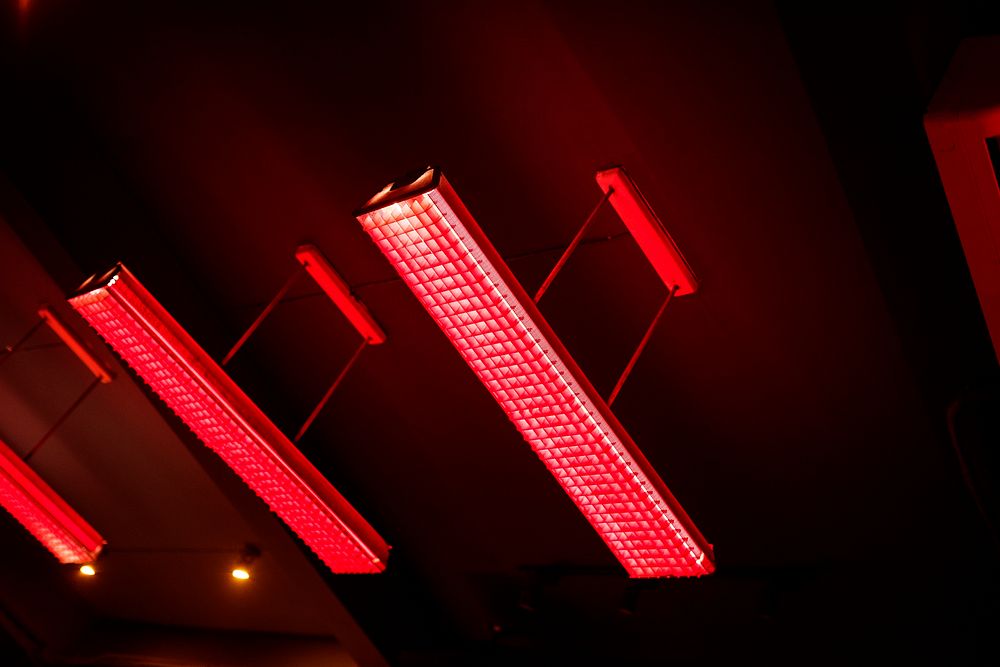 Red fluorescent lamp hanging from the ceiling