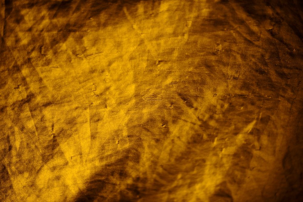 Golden fabric cloth material textured background