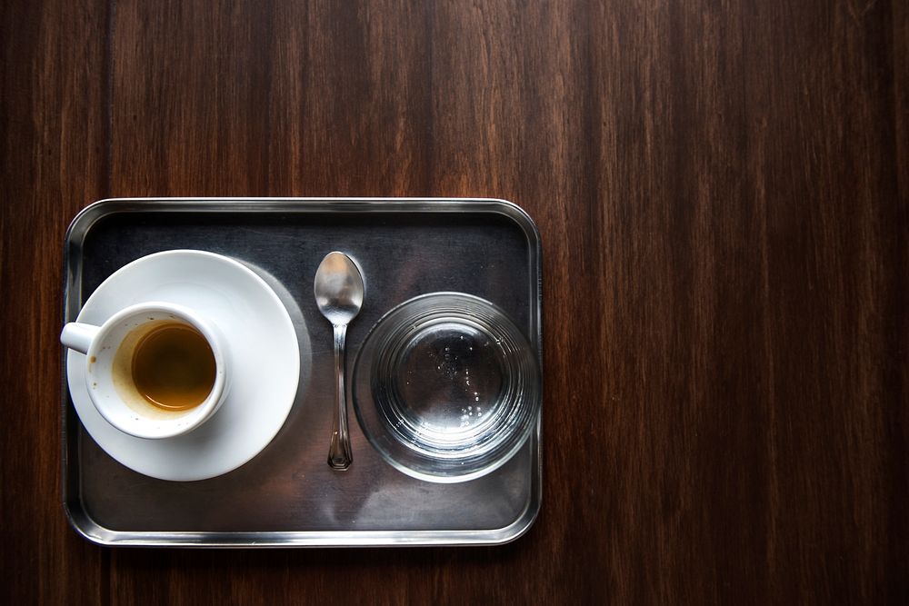 A tray with a coffee cup
