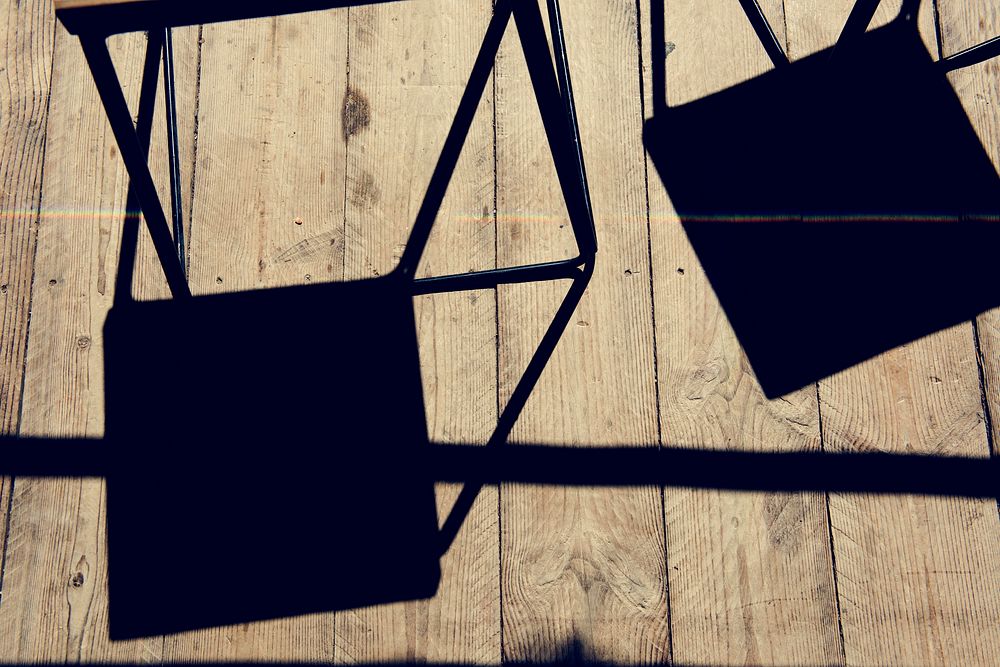 Shadow of chair and wooden plank