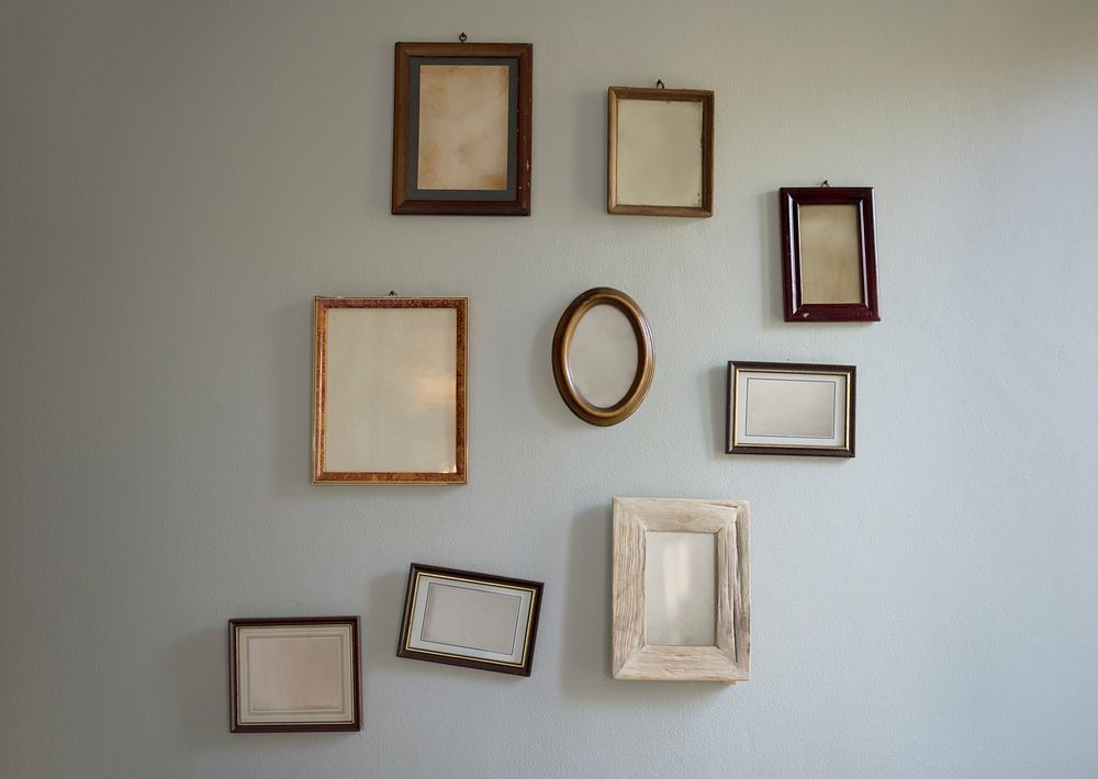 Blank Empty Photo Frames Hanging on the Wall