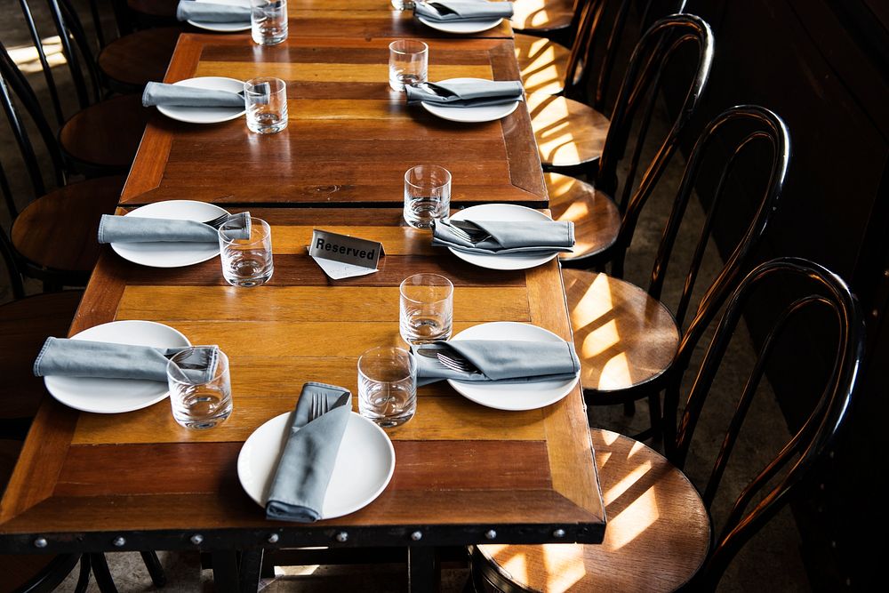 Reserved table at a restaurant, wooden table