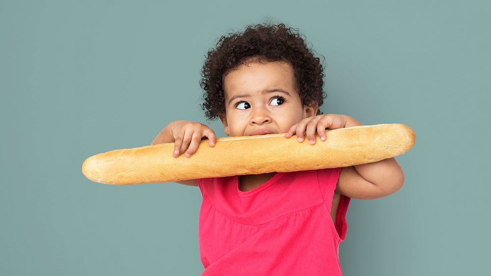 Little Kid With Bread Concept