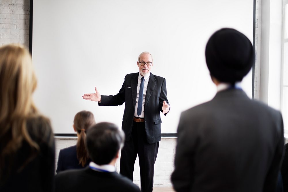 Businessman giving an audience a presentation