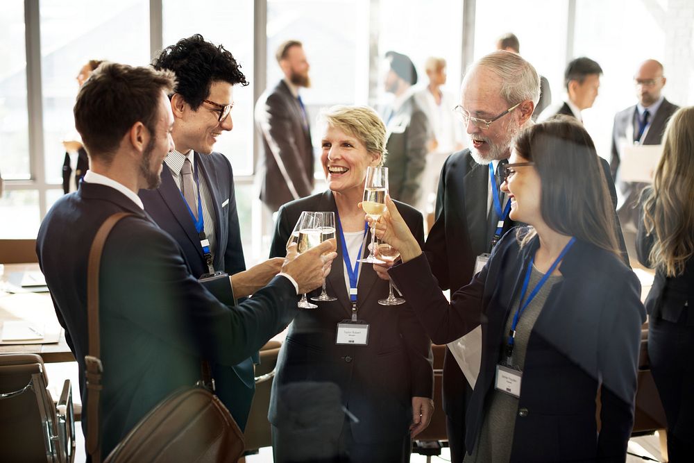 Group of business people drinking together