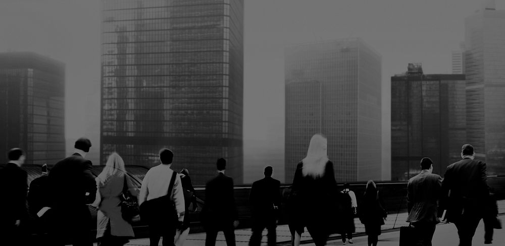 Business people commuting and cityscape black and white