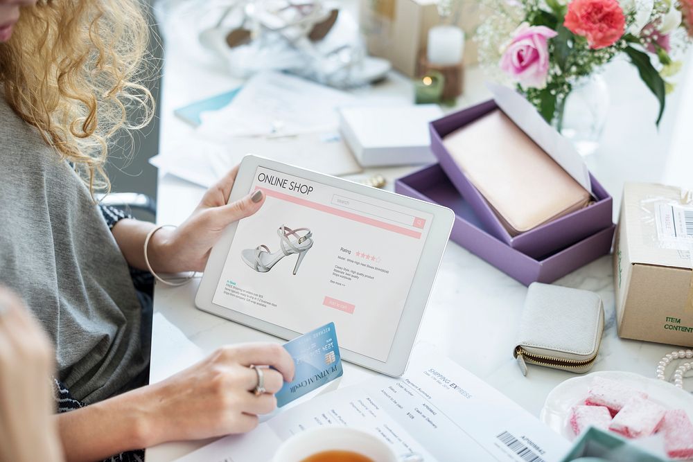 Woman using digital tablet for online shopping