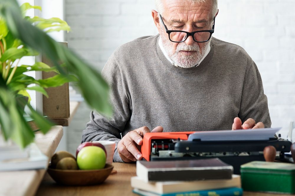 Senior Adult Typing Typerwriter Concept
