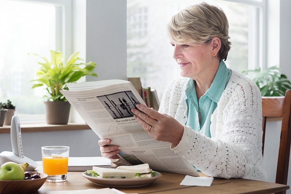 Senior Adult Reading Newspaper Leisure Concept