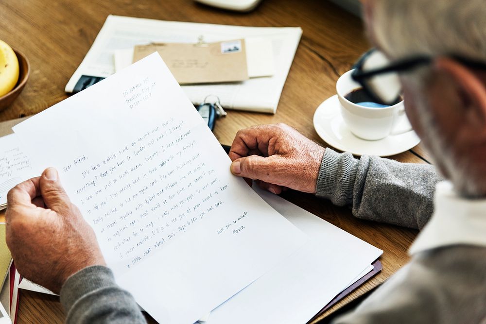 Senior Man Reading Letter Message Concept