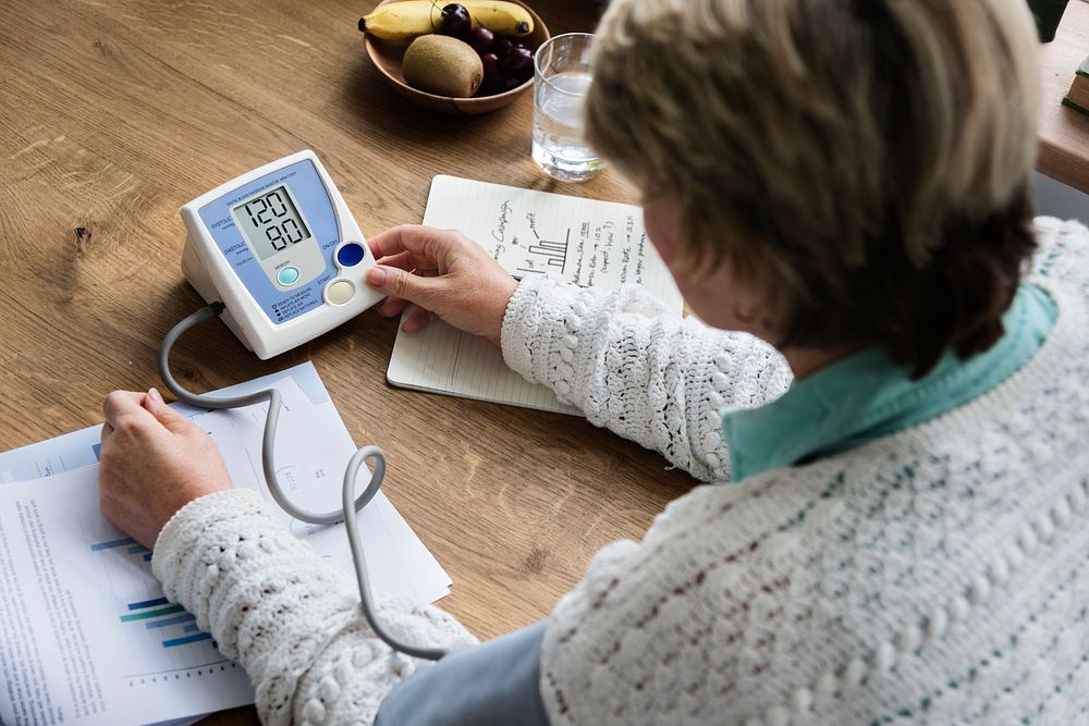 Senior Adult Measuring Blood Pressure Concept