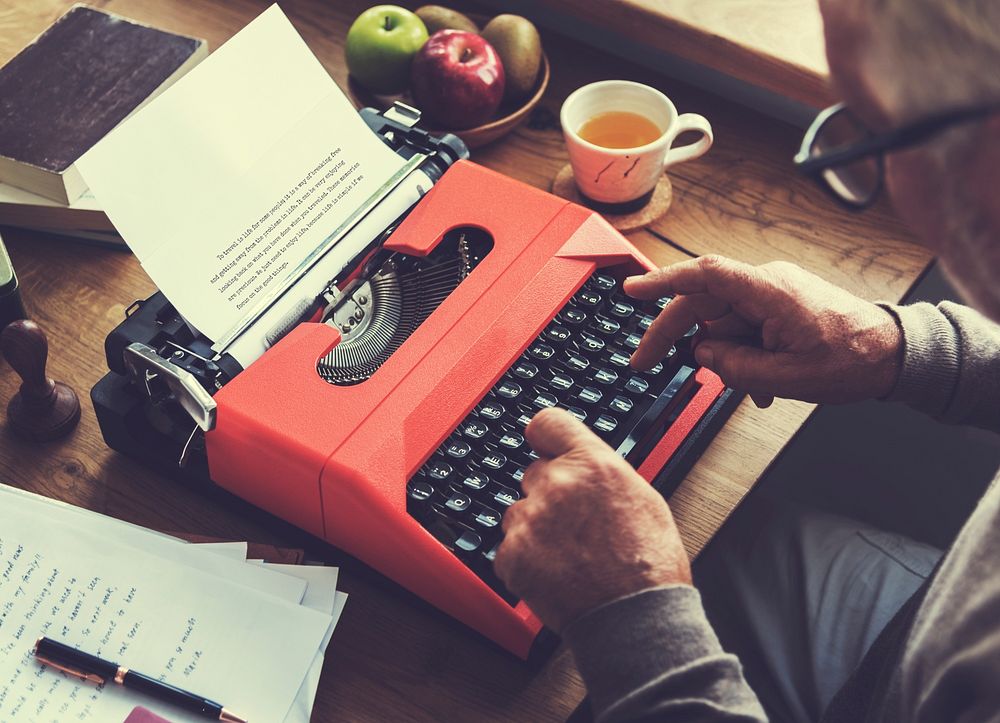 Senior Man Typing Typewriter Vintage Style Concept